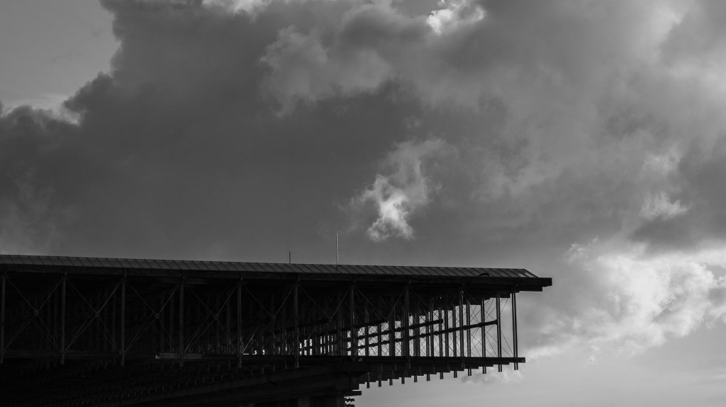 Glass roof over Convocation Mall in silhouette at Simon Fraser University.